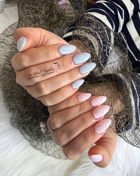 Almond nails in soft baby blue and pale pink gel