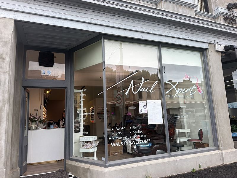 The Nail Xpert shopfront at 319 Clarendon Street, South Melbourne, with the script logo and walk-ins welcome on the window
